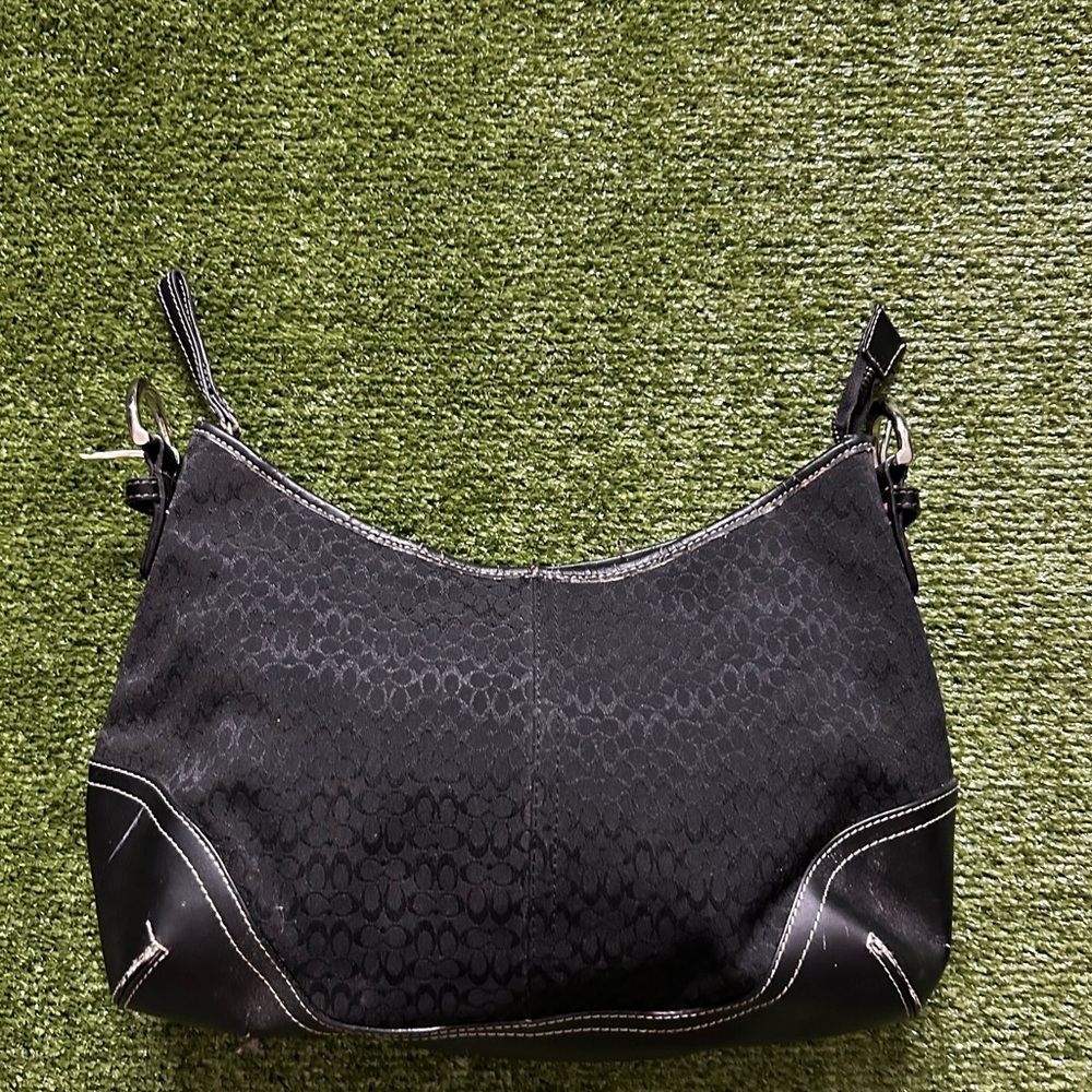 Black Crescent Shoulder Bag with Adjustable Strap and Monogram Pattern